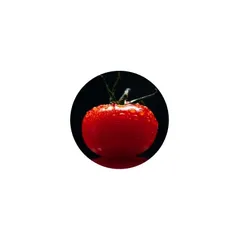 Ripe red tomatoes, whole and halved, the main food source of lycopene